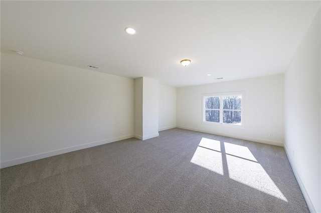 empty room with carpet flooring