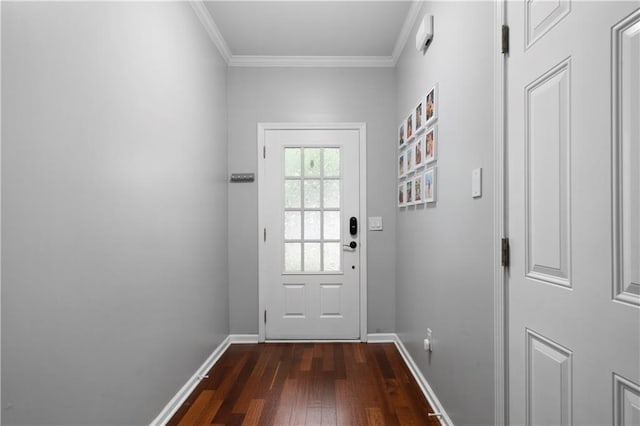 doorway to outside featuring dark wood finished floors, baseboards, and ornamental molding