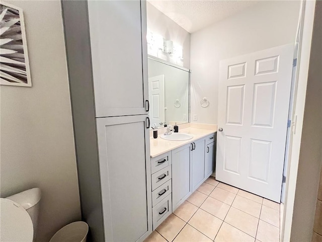 bathroom featuring vanity and tile patterned flooring