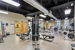 workout area featuring concrete floors