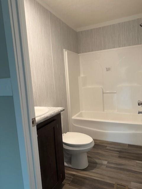 332 Dewaters Rd, Commerce, GA 30529 - bathroom with wood finished floors, vanity, toilet, and tub / shower combination