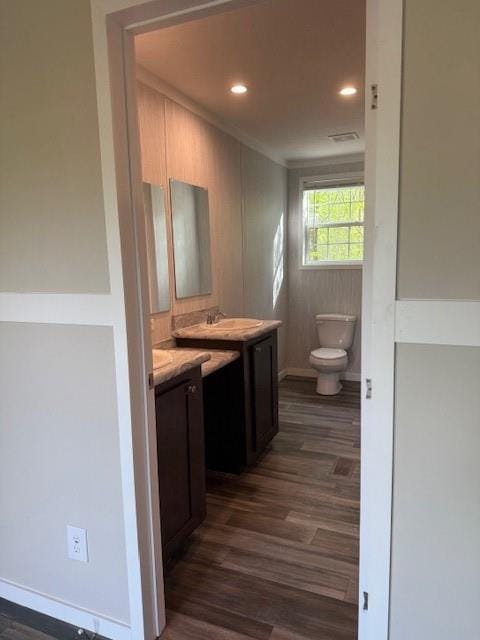 332 Dewaters Rd, Commerce, GA 30529 - bathroom featuring toilet, wood finished floors, vanity, recessed lighting, and baseboards