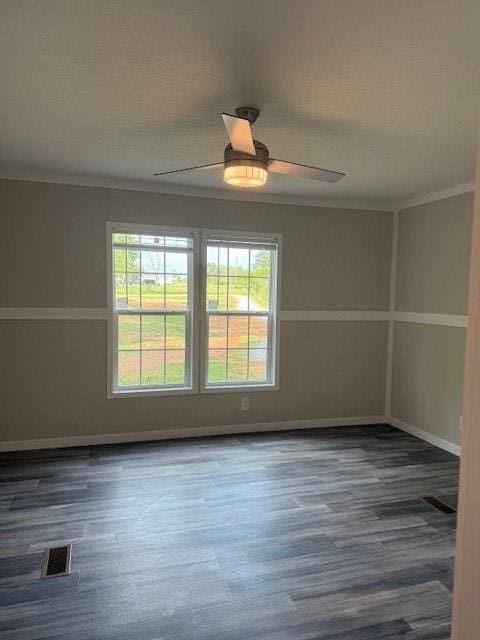 332 Dewaters Rd, Commerce, GA 30529 - unfurnished room featuring ceiling fan, ornamental molding, wood finished floors, and baseboards
