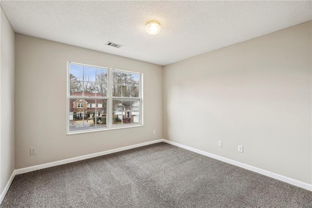 1559 Hillary Cove Ct, Lawrenceville, GA 30043 - unfurnished room featuring carpet floors, baseboards, and a textured ceiling