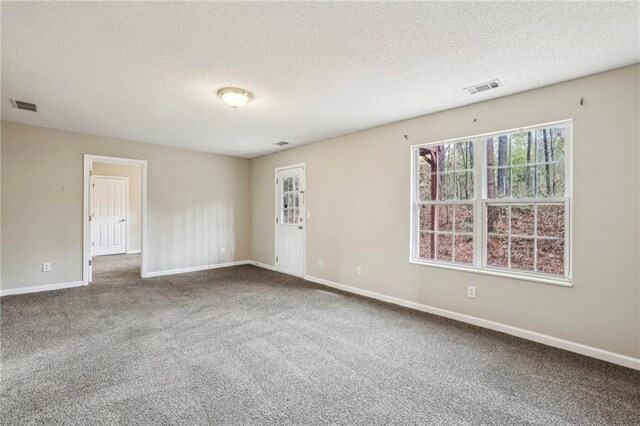 1559 Hillary Cove Ct, Lawrenceville, GA 30043 - carpeted spare room featuring a textured ceiling and baseboards