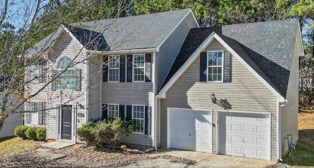 colonial home featuring a garage