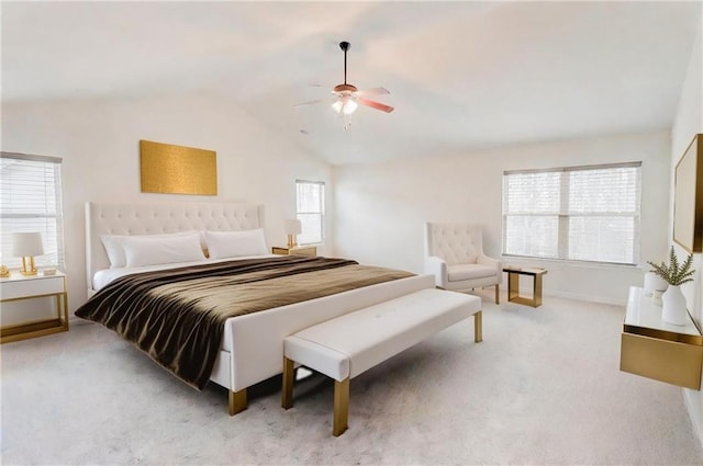 bedroom featuring carpet, lofted ceiling, and ceiling fan