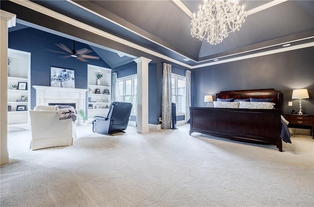 bedroom with decorative columns, a tray ceiling, vaulted ceiling, light colored carpet, and an inviting chandelier