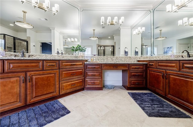 bathroom featuring tile patterned flooring, vanity, a shower with shower door, and ornamental molding