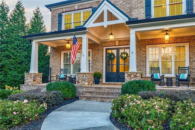 property entrance featuring a porch