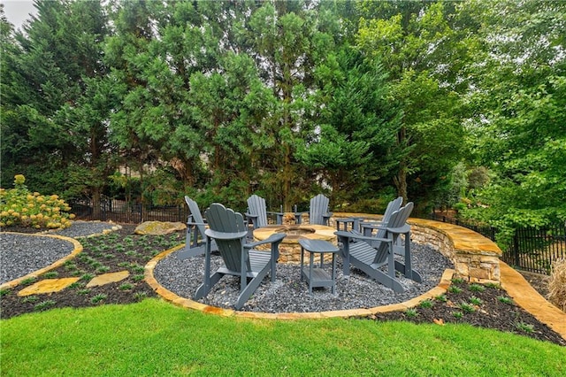 view of yard with a fire pit