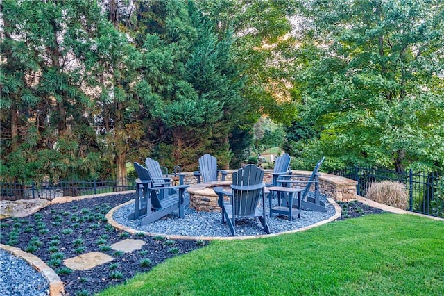 view of yard with an outdoor fire pit