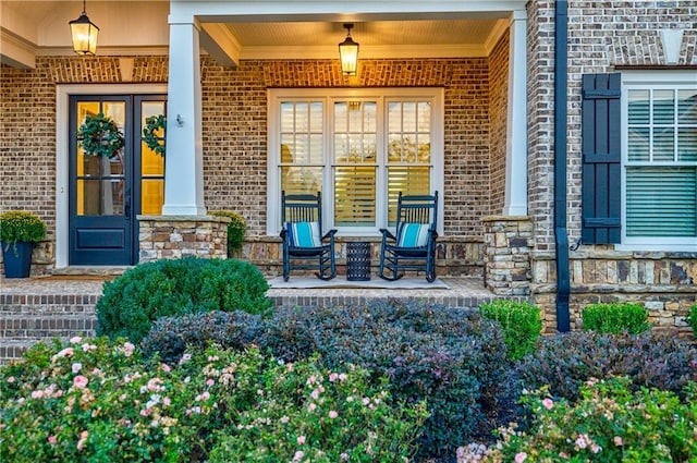 entrance to property with a porch