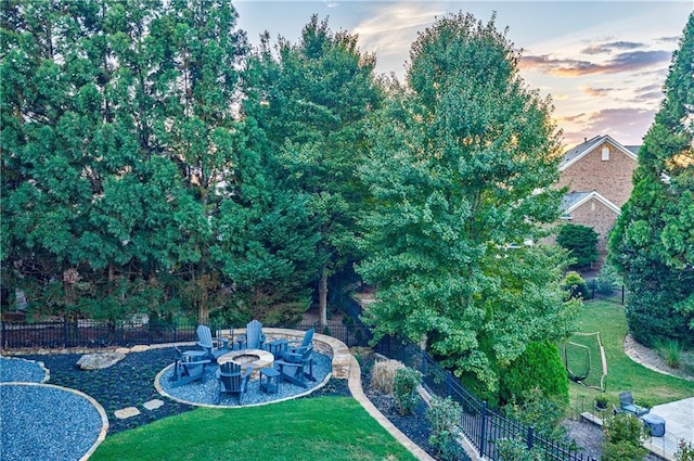 yard at dusk with a patio