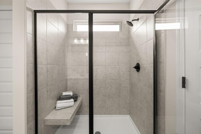 bathroom with an enclosed shower