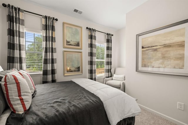 bedroom featuring carpet