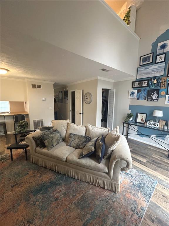 3414 Bayshore Dr, Atlanta, GA 30340 - living room with wood finished floors and crown molding