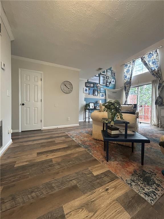 3414 Bayshore Dr, Atlanta, GA 30340 - living room with wood finished floors, a textured ceiling, ornamental molding, and baseboards