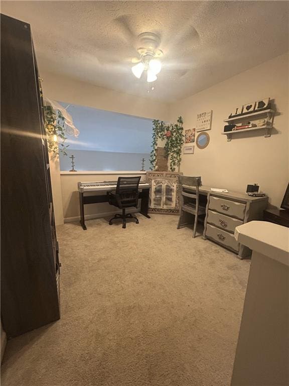 3414 Bayshore Dr, Atlanta, GA 30340 - office with a textured ceiling, light carpet, and a ceiling fan