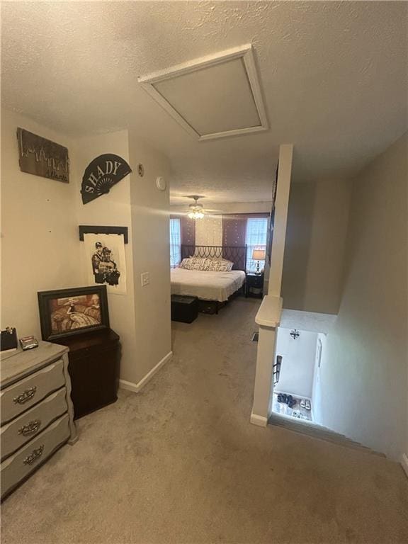 3414 Bayshore Dr, Atlanta, GA 30340 - carpeted bedroom featuring attic access, a textured ceiling, and baseboards