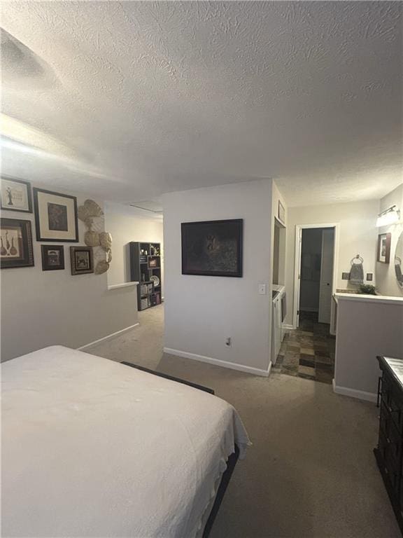 3414 Bayshore Dr, Atlanta, GA 30340 - bedroom with a textured ceiling, dark colored carpet, and baseboards
