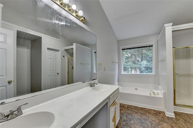 5385 Spotted Fawn Ct, Suwanee, GA 30024 - bathroom featuring a shower stall, lofted ceiling, double vanity, and a bath
