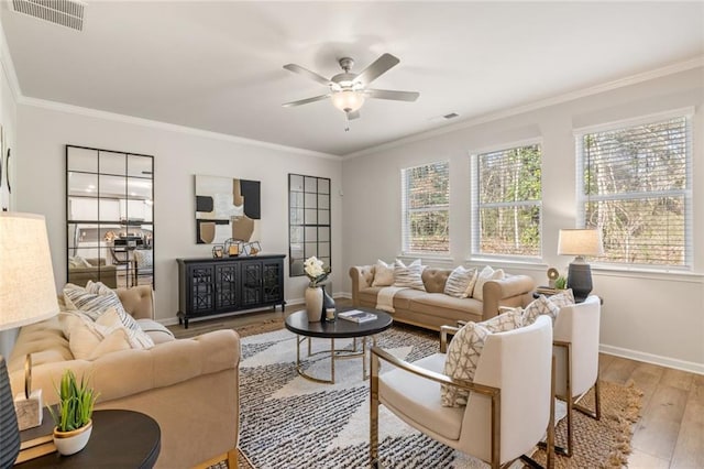 dining space featuring a notable chandelier, crown molding, and light hardwood / wood-style flooring