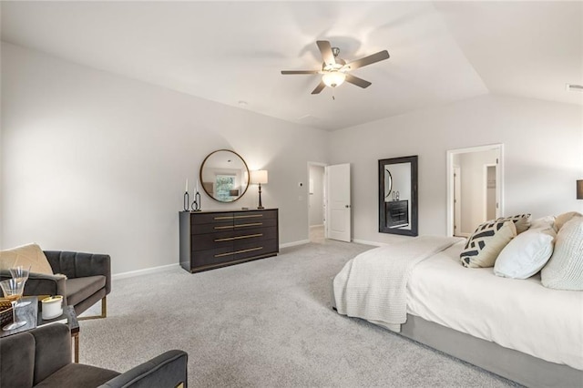 carpeted bedroom with ceiling fan, vaulted ceiling, and multiple windows