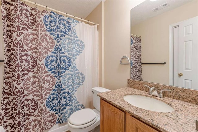 full bath with visible vents, toilet, vanity, a shower with shower curtain, and a textured ceiling