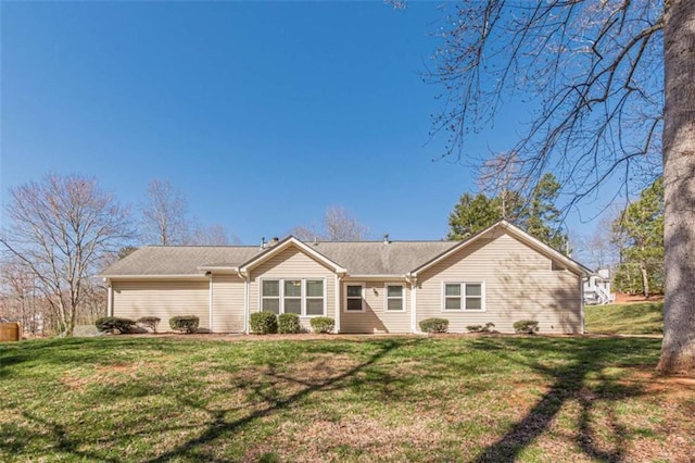 single story home featuring a front yard