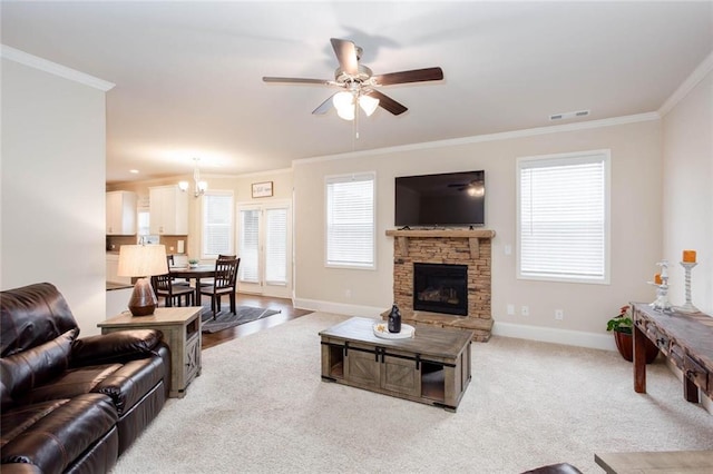 637 Little Bear Loop, Canton, GA 30114 - living room featuring baseboards, crown molding, ceiling fan, a chandelier, and light colored carpet