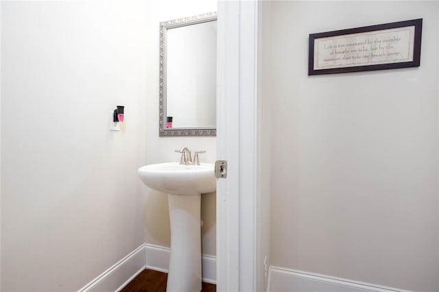 637 Little Bear Loop, Canton, GA 30114 - bathroom featuring baseboards and a sink