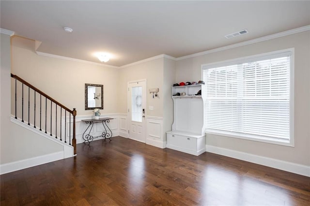 637 Little Bear Loop, Canton, GA 30114 - entrance foyer featuring crown molding, healthy amount of natural light, stairs, and wood finished floors
