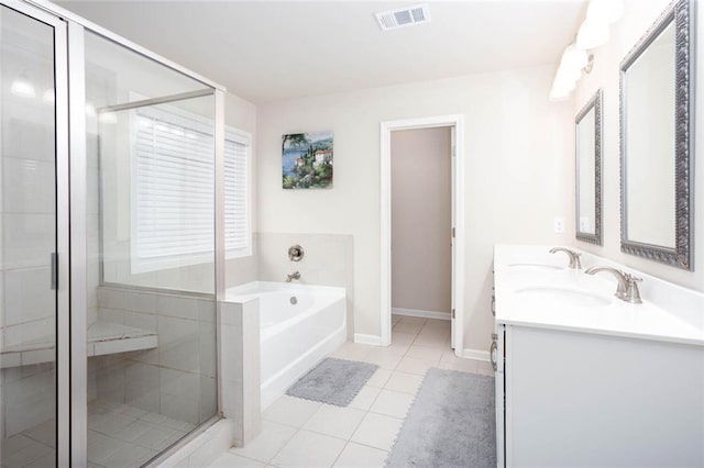 637 Little Bear Loop, Canton, GA 30114 - full bathroom featuring a bath, a stall shower, double vanity, tile patterned floors, and baseboards