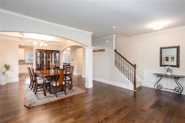 637 Little Bear Loop, Canton, GA 30114 - dining space featuring arched walkways, wood finished floors, stairway, a chandelier, and crown molding