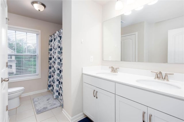 637 Little Bear Loop, Canton, GA 30114 - full bathroom with toilet, double vanity, tile patterned flooring, a shower with curtain, and baseboards