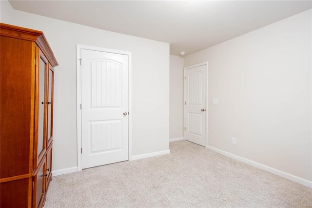 637 Little Bear Loop, Canton, GA 30114 - unfurnished bedroom featuring light carpet and baseboards