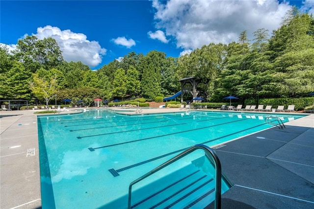 637 Little Bear Loop, Canton, GA 30114 - community pool featuring a water slide