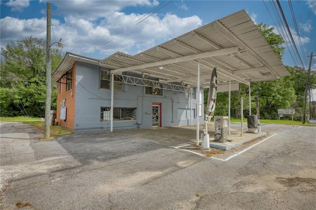 exterior space with a carport