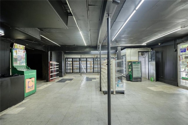 basement featuring light tile floors