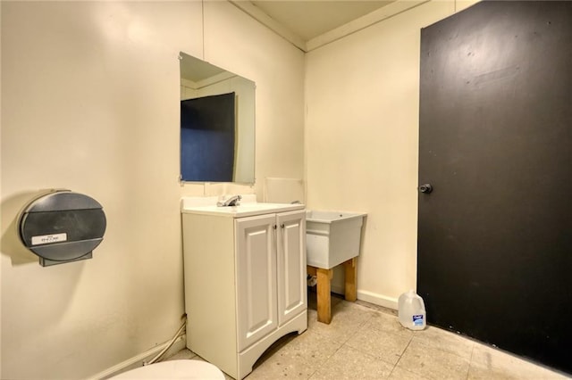 bathroom with tile floors and vanity