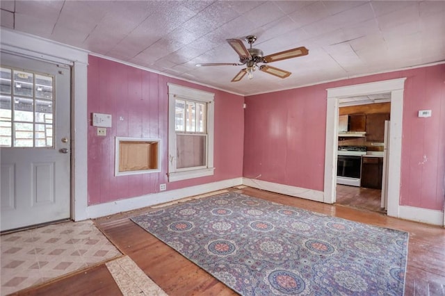 tiled empty room with ceiling fan