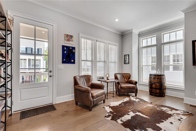 3108 Huntington Pl, Milton, GA 30004 - living area featuring ornamental molding, baseboards, wood finished floors, and recessed lighting