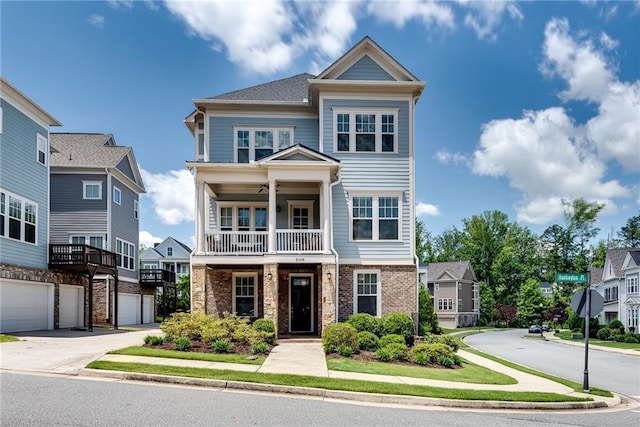 3108 Huntington Pl, Milton, GA 30004 - view of front facade with brick siding, a balcony, and a ceiling fan