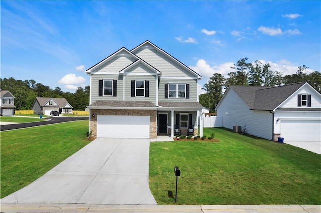 22 Mossy Oaks Ln NE, Rome, GA 30165 - craftsman inspired home featuring driveway, a front lawn, an attached garage, and a porch