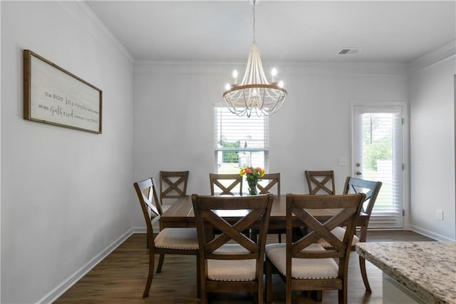 22 Mossy Oaks Ln NE, Rome, GA 30165 - dining space featuring a chandelier, dark wood-style floors, healthy amount of natural light, and ornamental molding