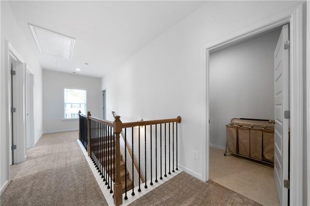 22 Mossy Oaks Ln NE, Rome, GA 30165 - hall with attic access, an upstairs landing, light colored carpet, and baseboards