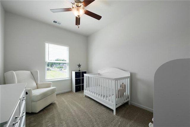 22 Mossy Oaks Ln NE, Rome, GA 30165 - bedroom with carpet, a nursery area, baseboards, and ceiling fan