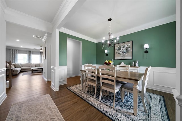 22 Mossy Oaks Ln NE, Rome, GA 30165 - dining area featuring ornamental molding, dark wood-style floors, a wainscoted wall, a chandelier, and a decorative wall