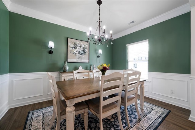 22 Mossy Oaks Ln NE, Rome, GA 30165 - dining area with dark wood-type flooring, a wainscoted wall, a chandelier, ornamental molding, and a decorative wall